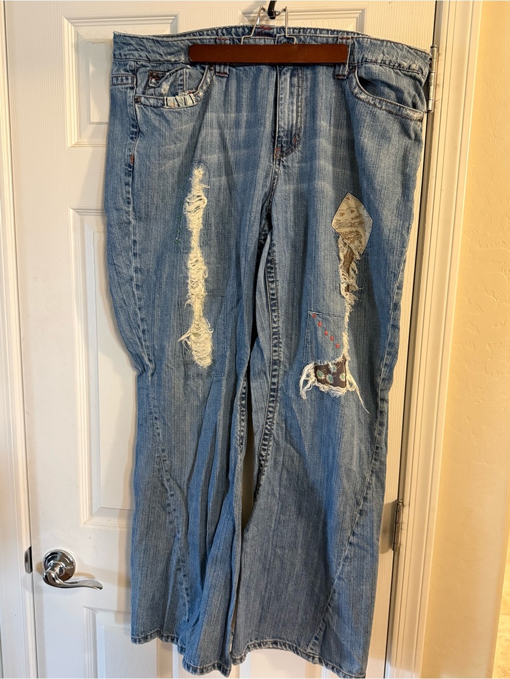 Woman’s Distressed Light Blue Patchwork Jeans